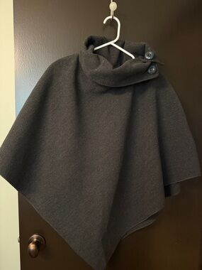 Dark Gray Flannel Poncho with button closure at the neck.